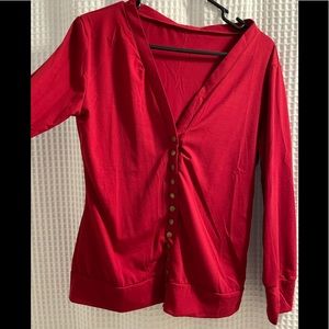 Red button up sweater